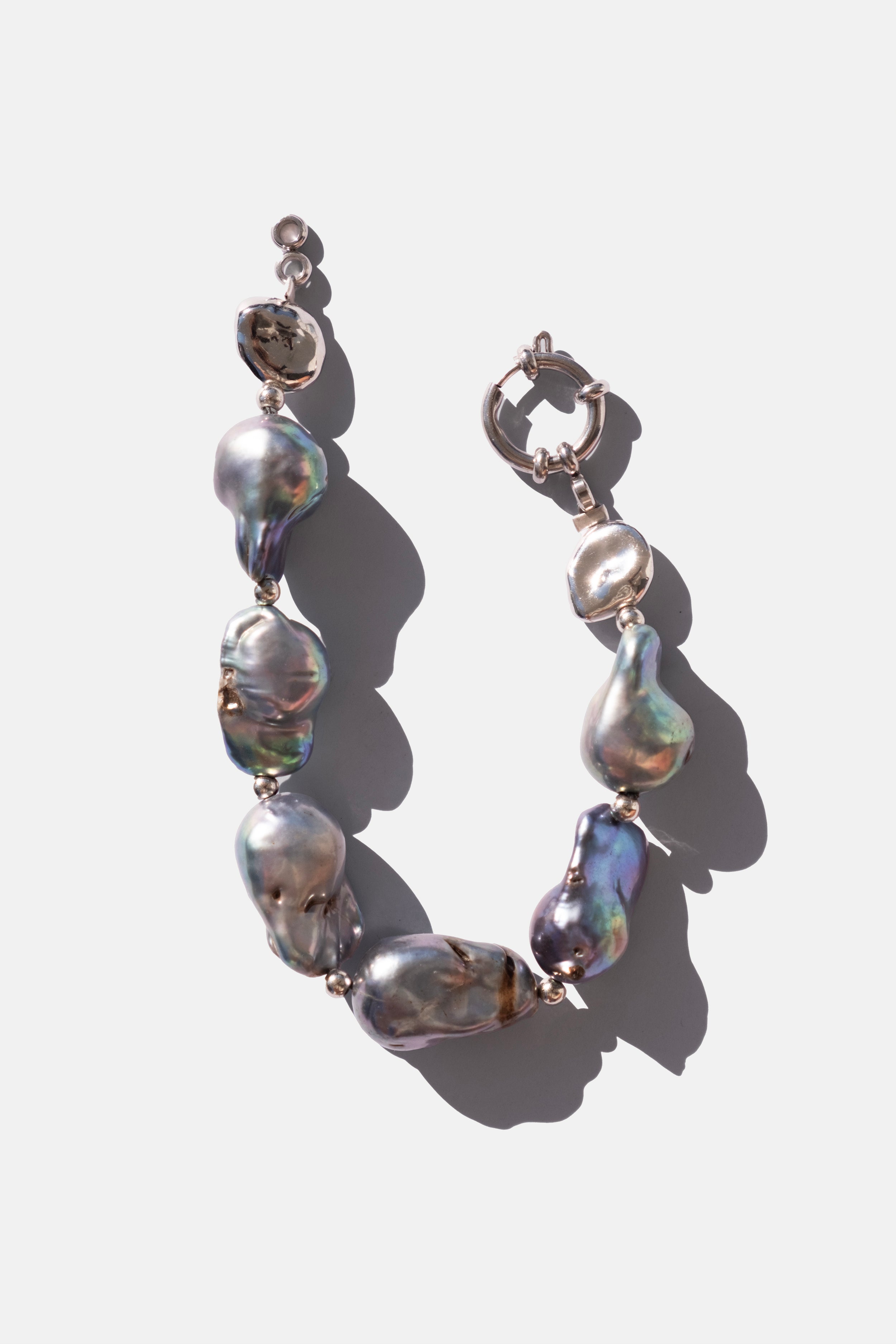 Pair of pearl earrings on a white background