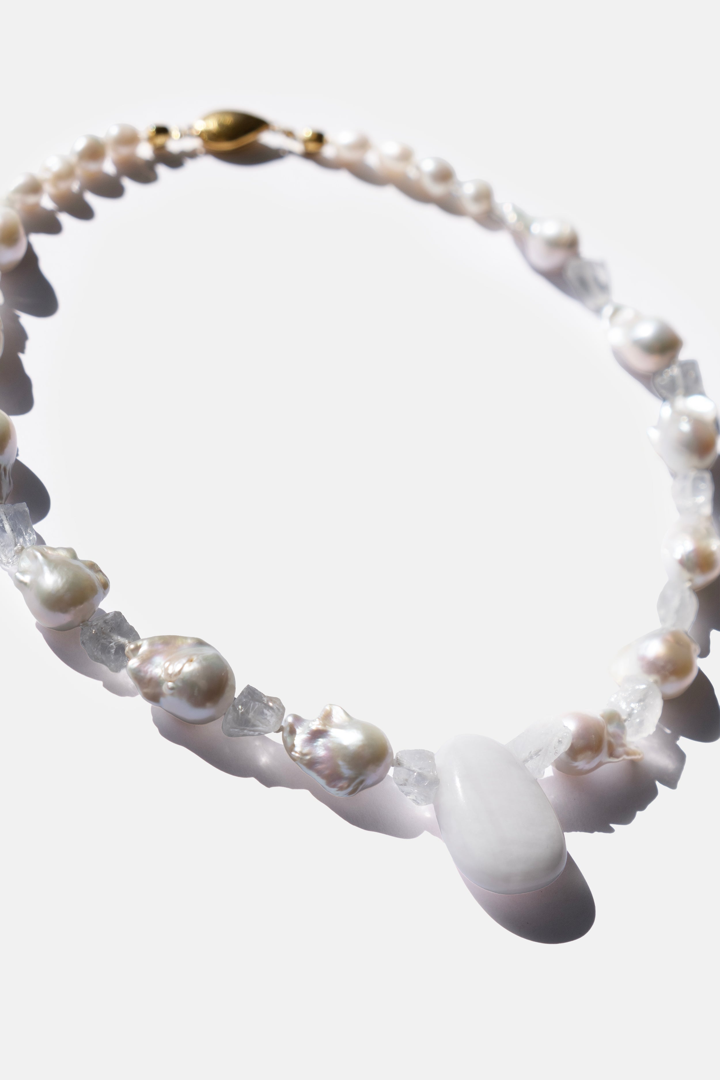 Pearl necklace with a white background